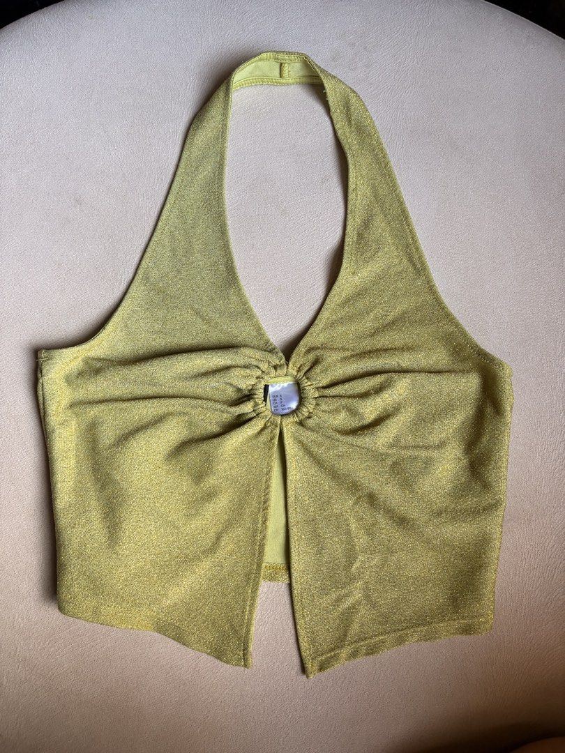 RUSH!!! H&M Divided Lime Green Glittery Halter Top (Category: Sleeveless) located in Makati City. Submitted by savannahsison (Listing ID 1471130988, Image 1). Description: - No flaws! used less than 10x probably - super cute!!! -Brand: H&M Divided - Color: Lime green with sparkly metallic finish - Size: S - Details: Center ring detail, front slit, halter neck tie-back.