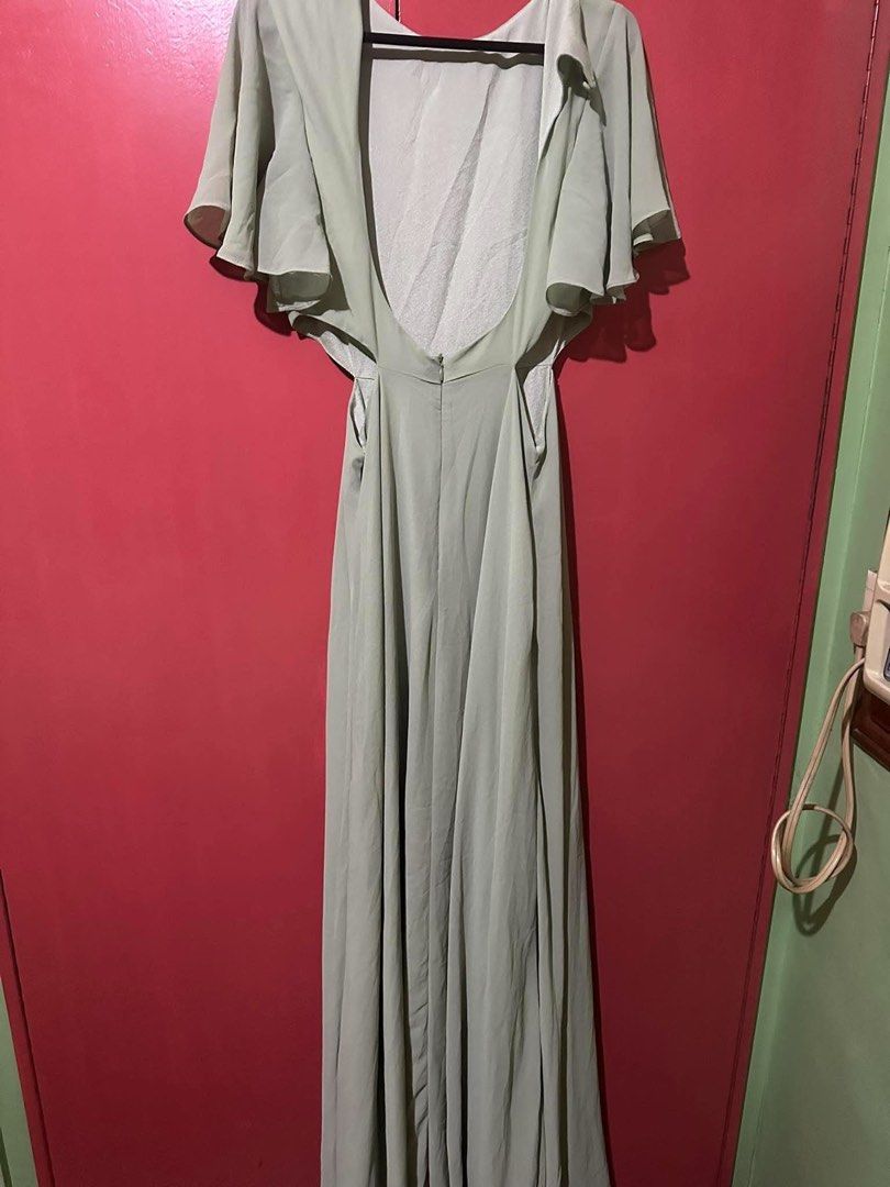 Sage Green Long Gown Backless Dress (Category: Evening dresses & gowns) located in Las Pinas. Submitted by sashimex (Listing ID 1471265741, Image 2). Description: - Color: Sage green - Design: Flared sleeves, low scoop back, and waist cutout details - Skirt: Flowy, full-length silhouette - Fit: Fully lined bodice with a secure lower back zipper closure - Condition: Brand new / Excellent quality (as described) - Perfect for: Weddings, parties, and