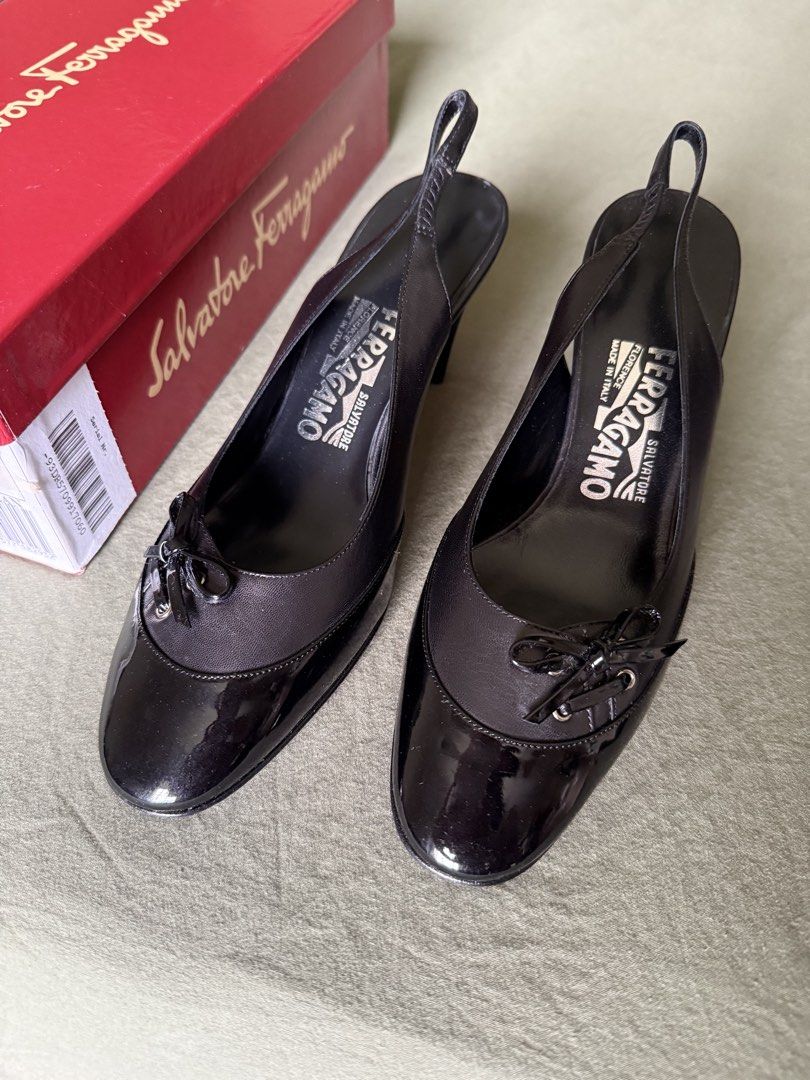 Salvatore Ferragamo Black Slingback Heels with Box (Category: Heels) located in Las Pinas. Submitted by krisclosetus (Listing ID 1471225366, Image 1). Description: - Brand: Salvatore Ferragamo - ETA: Las Piñas City 12/07/2026 - Size: 6 D or 6US - Style: Slingback heels - Color: Black - Material: Leather and patent leather upper - Heel Height: Approx. 3 inches - Details: Small bow on the toe - Origin: Made in Italy - Inclusions: Original red brand