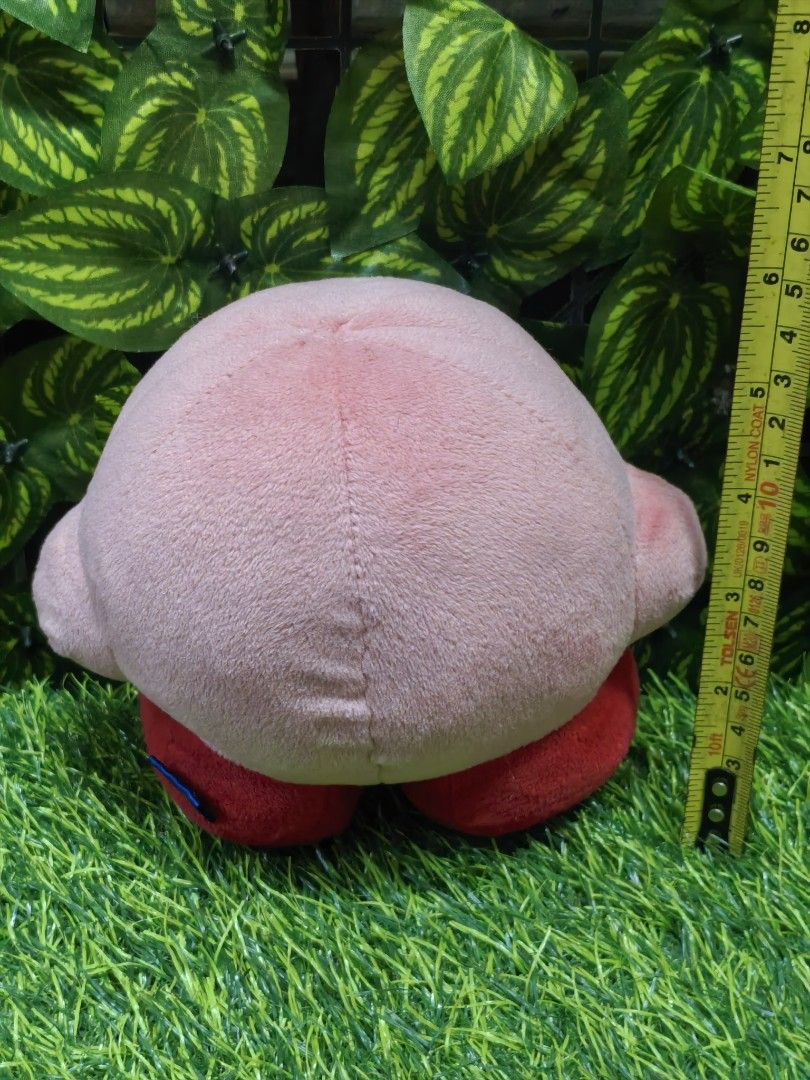 San-Ei Kirby Plush Stuffed Toy Nintendo (Category: Plushies & Soft Toys) located in Paranaque City. Submitted by furugiyafinds (Listing ID 1471228295, Image 2). Description: - Authentic Nintendo Kirby plush by San-Ei Co. - Size: Approx. 14 cm tall - Condition: Clean, no stains or damage - Features: Soft pink body, embroidered blue eyes, red feet, and original blue tag attached - Perfect for gaming fans and collectors.