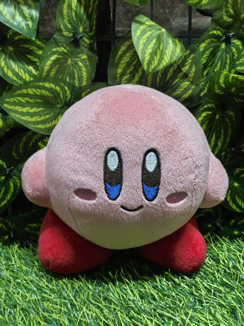 San-Ei Kirby Plush Stuffed Toy Nintendo (Category: Plushies & Soft Toys) located in Paranaque City. Submitted by furugiyafinds (Listing ID 1471228295, Image 1). Description: - Authentic Nintendo Kirby plush by San-Ei Co. - Size: Approx. 14 cm tall - Condition: Clean, no stains or damage - Features: Soft pink body, embroidered blue eyes, red feet, and original blue tag attached - Perfect for gaming fans and collectors.
