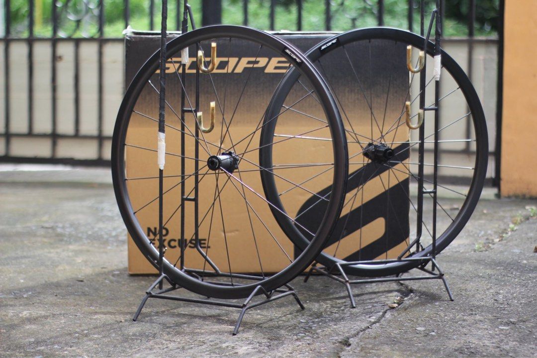 Scope S3 Carbon Wheelset (Category: Bicycles) located in Cavite. Submitted by aubikes (Listing ID 1471178031, Image 1). Description: - Item: Scope S3 Carbon Road Bike Wheelset (Front and Rear) - Condition: Brand new, unused, and properly stored in its original box - Aesthetics: Sleek black carbon rims with Scope branding and black spokes - Hubs: Thru-axle hubs included - Ideal Use: Perfect performance upgrade for road racing or training builds -f