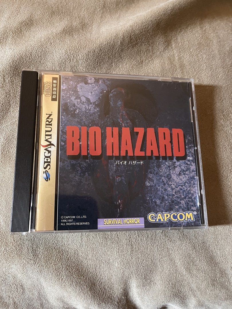 Sega Saturn BIO HAZARD (Category: Others) located in Quezon City. Submitted by ArtsyLife1012 (Listing ID 1471141277, Image 1). Description: Sega Saturn BIO HAZARD complete in box --jpnese Firm Price 800 php Grab/lalamove pick up Location: T sora Ave, Qc Gcash or BPI payment.