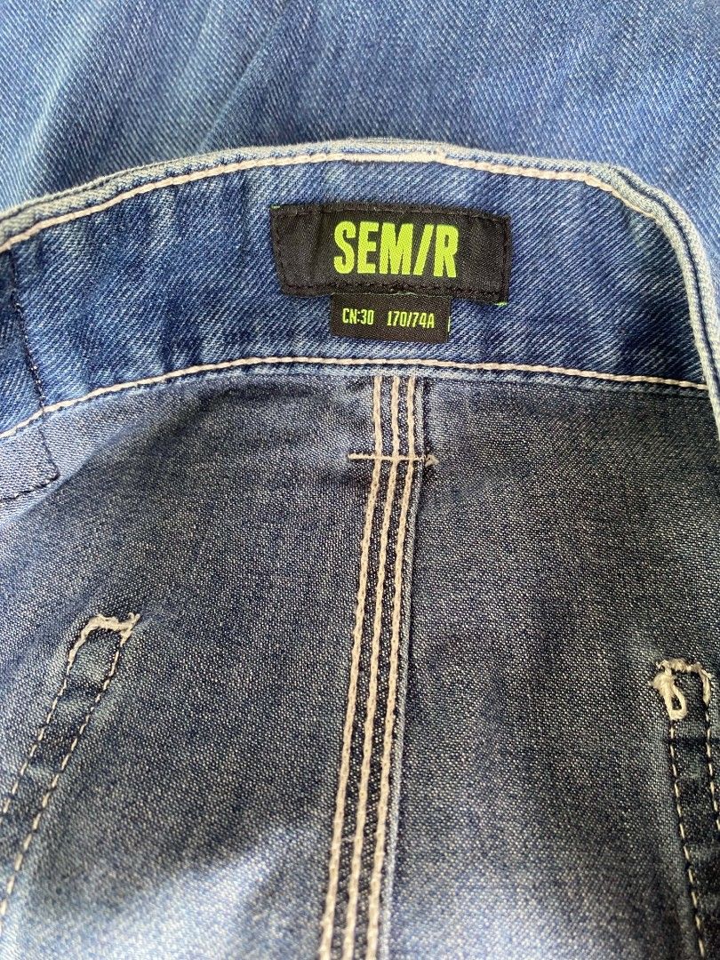 SEM/R Denim Cargo Pants Blue Size 30 (Category: Jeans) located in Cabuyao City. Submitted by vhincemagat16 (Listing ID 1471194633, Image 3). Description: - Brand/Model: SEM/R denim cargo pants - Color: Classic blue - Size: CN:30 (170/74A), straight leg fit - Details: Multiple utility pockets and left-side hammer loop - Design: Stylish contrast white stitching throughout - Branding: Dark leather-like patch on the back waistband.