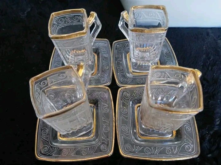 Shala tea (Category: Coffee & Tea Tableware) located in Manila. Submitted by rubymielbona (Listing ID 1471233431, Image 1). Description: - Product Name: Shala tea cup and saucer set - Material: Clear glass with elegant gold trim details - Design: Unique square-shaped cups and matching saucers with intricate patterns - Condition: Well-maintained and ready to use - Ideal Use: Perfect for serving tea, coffee, or as a display piece for your collectio