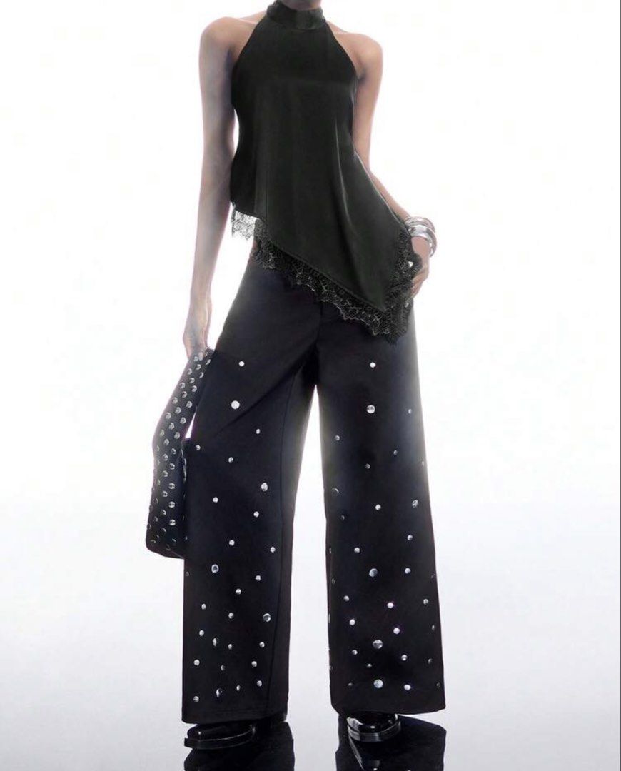 Black Lace Asymmetrical Backless Top (Category: Sleeveless) located in Pasay City. Submitted by declutterwme01 (Listing ID 1471264802, Image 1). Description: USED ONCE FOR PICTORIAL. XS-S (Adjustable strap) Loc: Taft, España GCASH, Via Lalamove STRICTLY NO RETURN OF ITEMS ONCE PURCHASED. PM ME for infos!.