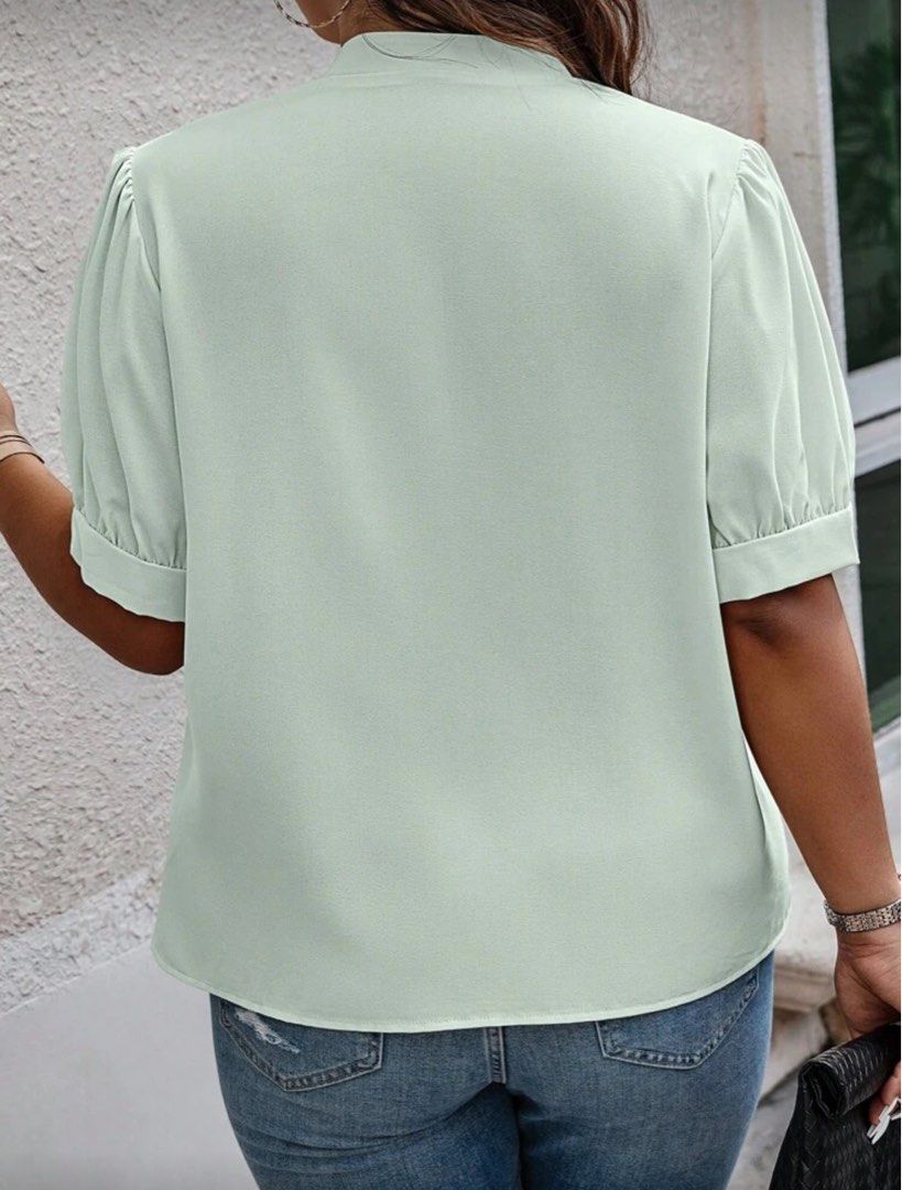 Shein Plus Size Green Puff Sleeve Button Front Tie Hem Shirt Blouse (Category: Blouses) located in Malolos. Submitted by basementbargain (Listing ID 1471226421, Image 2). Description: Size: 0XL Product Measurement: Shoulder: 41 cm, Length: 64.5 cm, Sleeve Length: 28.3 cm, Bust: 115.5 cm, Cuff: 38.8 cm.