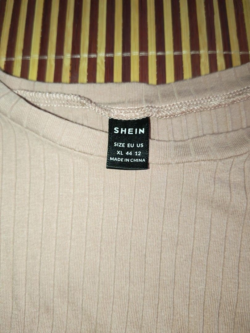 Shein Ribbed Crop Tops Bundle Pink Blue XL (Category: Shirts) located in Las Pinas. Submitted by meggiemaggie (Listing ID 1471192822, Image 2). Description: - Set of 2 Shein ribbed crop tops (Pink & Light Blue) - Size: super stretch, can fit med-xl - Details: Short sleeves with trendy lettuce hem edges - Fabric: Super stretchy and comfy for everyday wear - Condition: Brand new, kept in closet, selling as a bundle.