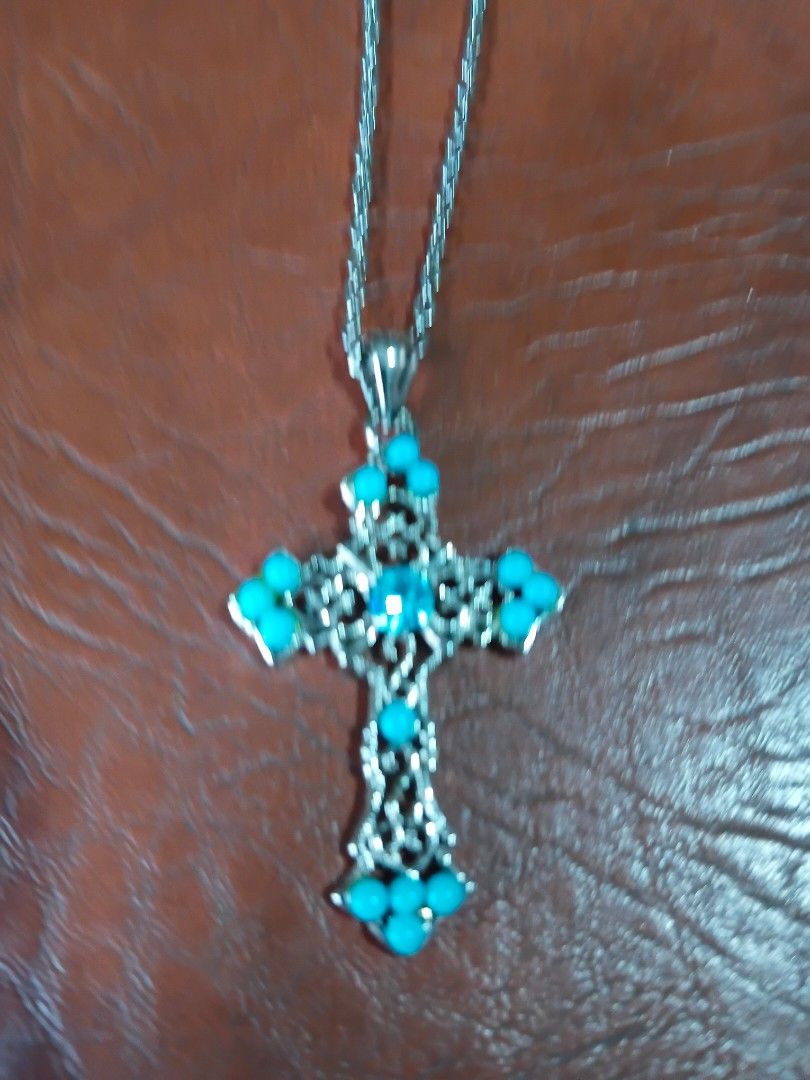 Silvertone cross necklace w blue stone (Category: Necklaces) located in Paranaque City. Submitted by 4thestate.surplusan (Listing ID 1471165659, Image 2). Description: silvertone blue cross necklace.