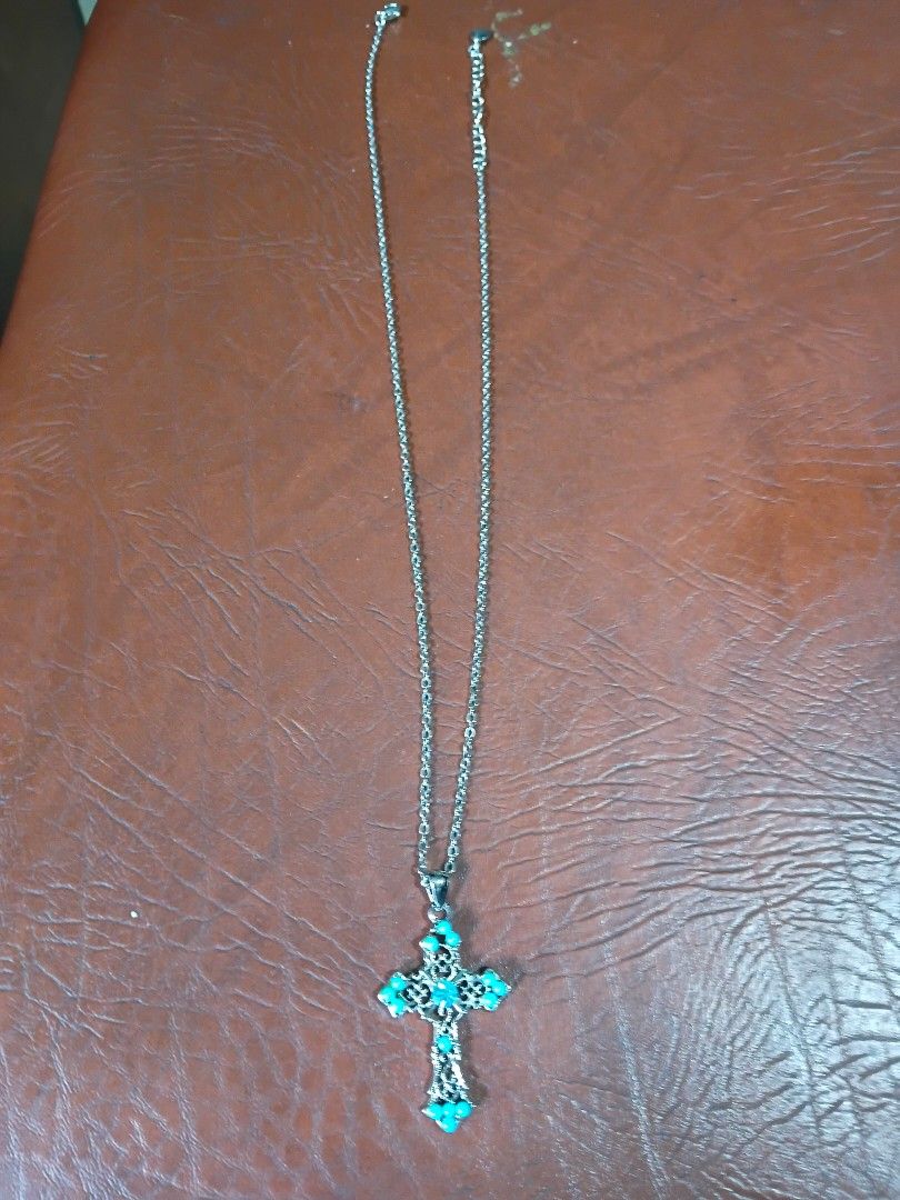 Silvertone cross necklace w blue stone (Category: Necklaces) located in Paranaque City. Submitted by 4thestate.surplusan (Listing ID 1471165659, Image 1). Description: silvertone blue cross necklace.
