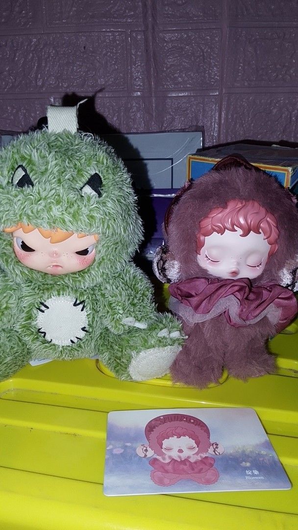 Skullpanda Pop Mart Plush Figures (Category: Plushies & Soft Toys) located in Mandaluyong City. Submitted by bonnbony (Listing ID 1471268270, Image 1). Description: - Authentic Pop Mart Skullpanda plush and Hirono Dinosaur set - Small Chips on Blossom, and Chip upper lip on Dino - Wysiwyg, they are very well loved 🥹 - Complete Inclu RFS: Need extra allowance for the next 2 weeks MOP: GCASH/CASH MOD: Lalamove only, Or meet at SM Megamall .