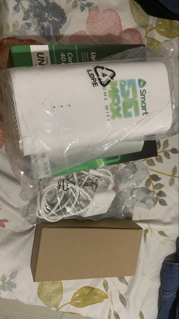 Smart 5G Max Home Wifi Router (Category: Networking) located in Manila. Submitted by seraphinashoppe (Listing ID 1471144894, Image 3). Description: -Barely used smart home wifi (still has the free registered sim for 15 days) Details about the item: - Superfast 5G speeds: Delivers up to 600 Mbps for seamless streaming and gaming - Multi-device connection: Supports up to 40 devices simultaneously - Complete inclusions: Comes with power adapter, cab