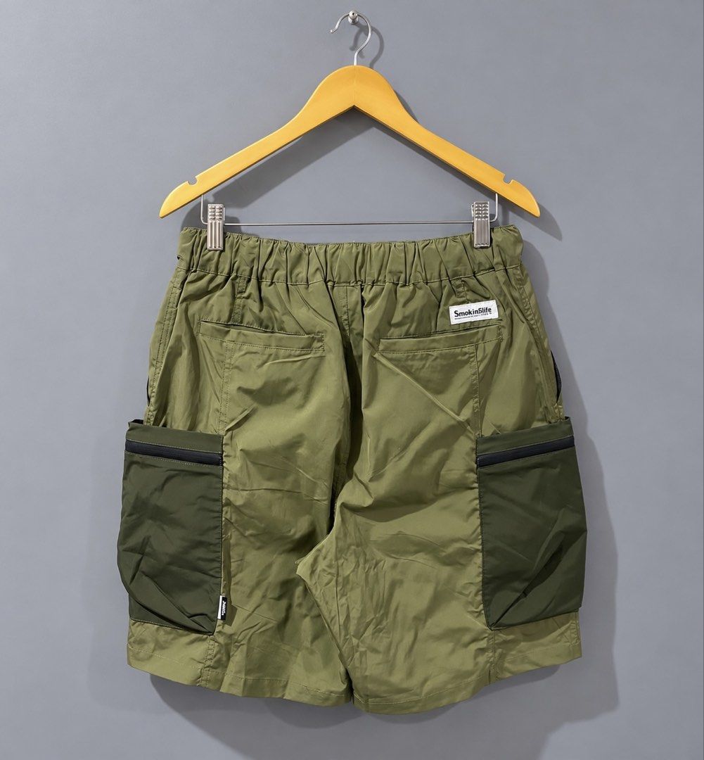 SmokingLife Functional Multi-Pocket Utility Cargo Shorts (Category: Shorts) located in Makati City. Submitted by kendrickstuffs (Listing ID 1471149684, Image 2). Description: SmokingLife Functional Multi-Pocket Utility Cargo Shorts Large ontags 30'-38' waistline garterized w nylon web belt system 21' length 12' leg opening 9' inseam No issue Verygood condition 1300 only.