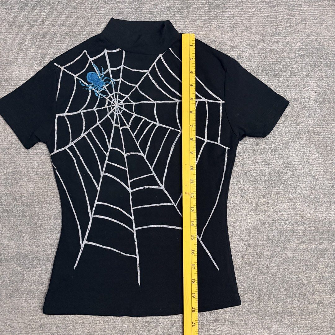 Spiderweb mock neck Y2K graphic (Category: Blouses) located in Batangas. Submitted by bermudaph.2 (Listing ID 1471223404, Image 3). Description: No brand Cut tag.