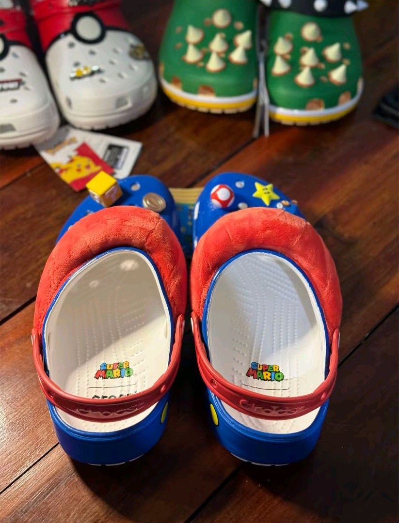SUPER MARIO CROCS - MARIO (Category: Slippers & Slides) located in Manila. Submitted by ddg_s (Listing ID 1471284569, Image 3). Description: 36 - 40 41 - 45 With pouch and eco bag.