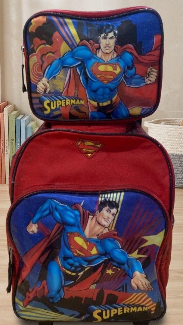Superman Kids Rolling Backpack with Detachable Lunch Bag (Category: Babies & Kids Fashion) located in Manila. Submitted by dizonnixni94357 (Listing ID 1471168987, Image 1). Description: - Superman rolling backpack with matching lunch bag - Vibrant comic book graphics and classic superhero logo badge - Retractable pull handle, adjustable shoulder straps, and dual side mesh pockets - Wipe-clean interior lining for easy maintenance - Condition: Red 