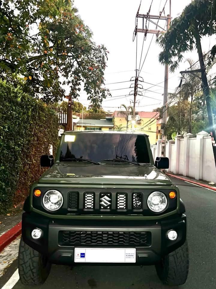 Suzuki Jimny 1.3 (A) (Category: Used Cars) located in Pasig City. Submitted by lia622 (Listing ID 1471288347, Image 1). Description: FOR SALE: 2026 SUZUKI JIMNY JB74 3-DOOR 4X4 AT Asking Price: ₱1,200,000 (Negotiable) - 2026 Suzuki Jimny JB74 - 3-Door | 4x4 | Automatic Transmission - 3,000+ Miles Odometer - First Owner - Personally Used, Not Buy & Sell - Well Maintained Upgrades & Accessories Installed by The Jimny Hub: - Old Man Emu (OME) Suspen