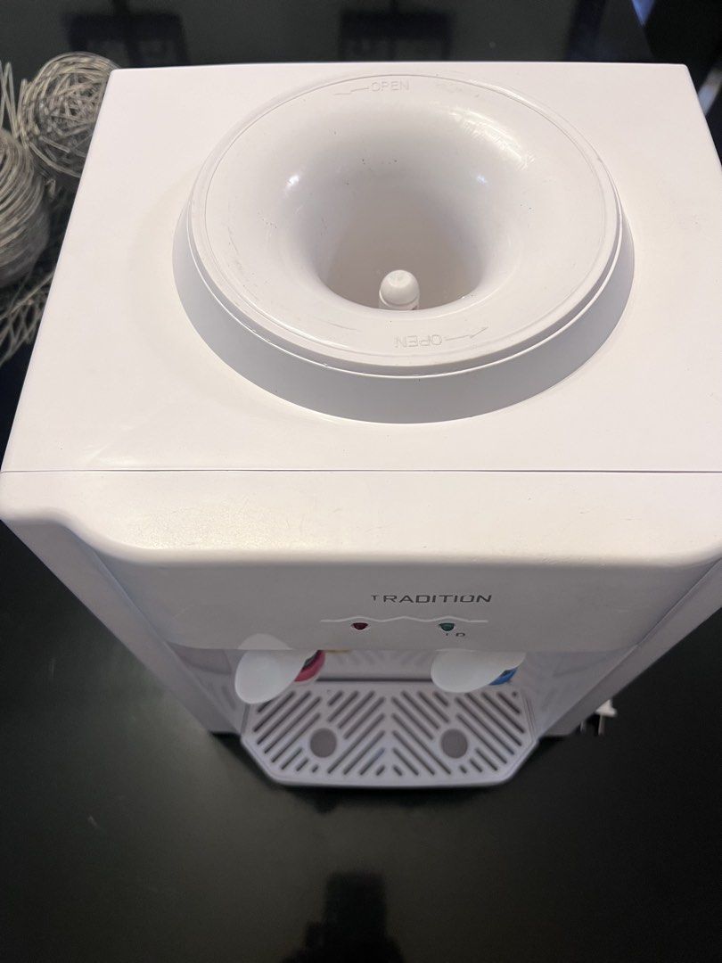 Table Top Hot and Cold Water Dispenser (Category: Other Home Appliances) located in Quezon City. Submitted by reyna.1106 (Listing ID 1471173400, Image 2). Description: Table Top Hot and Cold Water Dispenser.