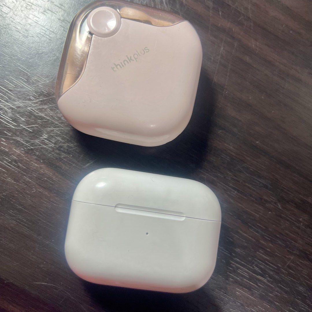 (TAKE ALL) Lenovo thinkplus and Apple AirPods Pro Wireless Earbuds Bundle (Category: Earphones) located in Manila. Submitted by banana.pengu (Listing ID 1471219974, Image 1). Description: - Bundle includes 2 pairs of wireless earbuds with their charging cases - Set 1: Pink Lenovo thinkplus with a trendy translucent lid - Set 2: Classic White Apple AirPods Pro - Condition: 100% working, charges normally, well-maintained - Flaw: the rubber part of 