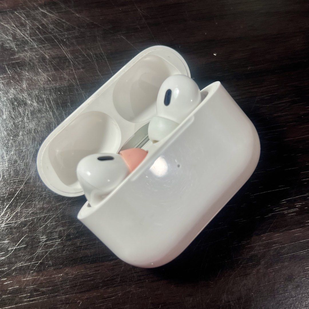 (TAKE ALL) Lenovo thinkplus and Apple AirPods Pro Wireless Earbuds Bundle (Category: Earphones) located in Manila. Submitted by banana.pengu (Listing ID 1471219974, Image 3). Description: - Bundle includes 2 pairs of wireless earbuds with their charging cases - Set 1: Pink Lenovo thinkplus with a trendy translucent lid - Set 2: Classic White Apple AirPods Pro - Condition: 100% working, charges normally, well-maintained - Flaw: the rubber part of 