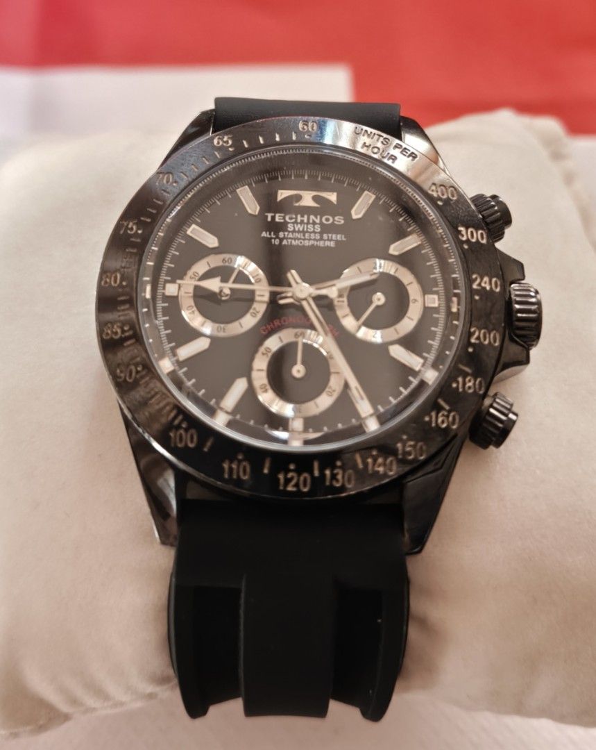 Technos Swiss TGM815 Chronograph Watch (Category: Men's Watches) located in Angono. Submitted by allenpaul26 (Listing ID 1471138304, Image 1). Description: - Brand/Model: Technos Swiss Chronograph (TGM815) - Material: All stainless steel case with sleek black finish - Dial & Bezel: Black dial with three sub-dials and tachymeter bezel - Strap: Comfortable black rubber strap with secure buckle closure - Water Resistance: Up to 10 ATM / 10 bar - Con