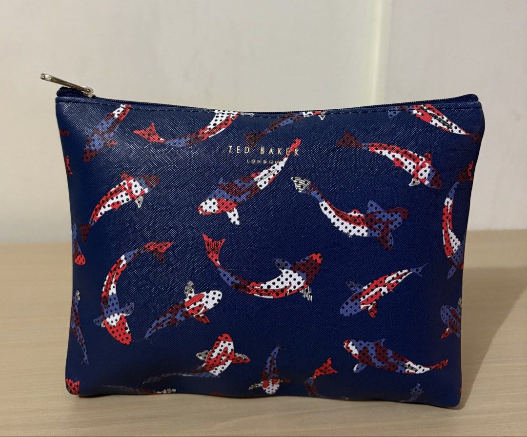 Ted Baker London Travel Pouch (Category: Purses & Pouches) located in Cavite. Submitted by chubbsavenue (Listing ID 1471174376, Image 1). Description: I got this from one of my trips with American Airlines. Guaranteed Authentic!.