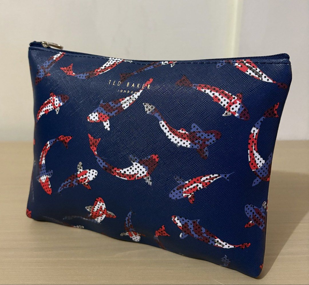 Ted Baker London Travel Pouch (Category: Purses & Pouches) located in Cavite. Submitted by chubbsavenue (Listing ID 1471174376, Image 2). Description: I got this from one of my trips with American Airlines. Guaranteed Authentic!.