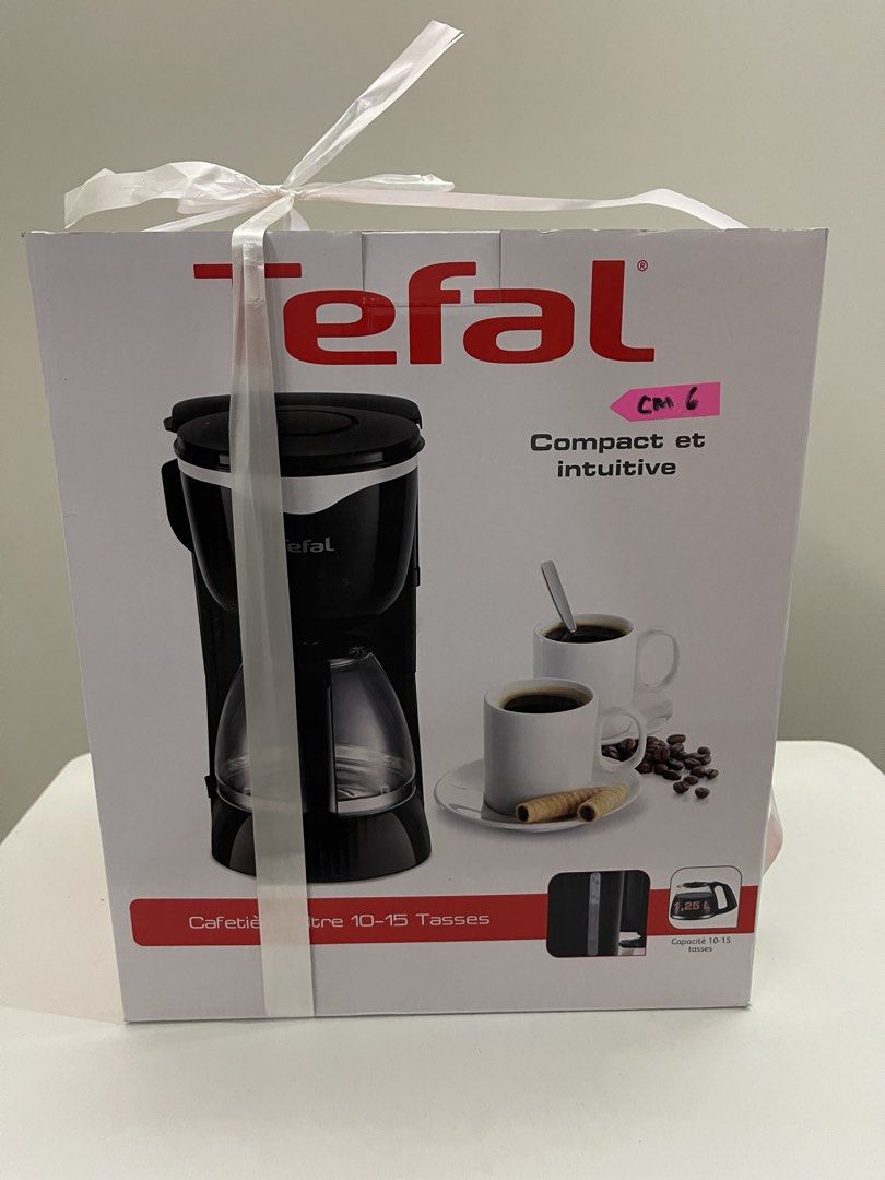 Tefal Compact Filter Coffee Maker 10-15 Cups CM442827 (Category: Coffee Machines & Makers) located in Quezon City. Submitted by bravehorse_f1f6d5 (Listing ID 1471206246, Image 1). Description: - Brand new, sealed box l - Model: Tefal CM442827 (Compact & Intuitive) - Capacity: 1.25L / 10 to 15 cups - Features: Visible water level indicator & easy-access water tank/filter holder - Convenience: Anti-drip system & heating element to keep coffee warm 