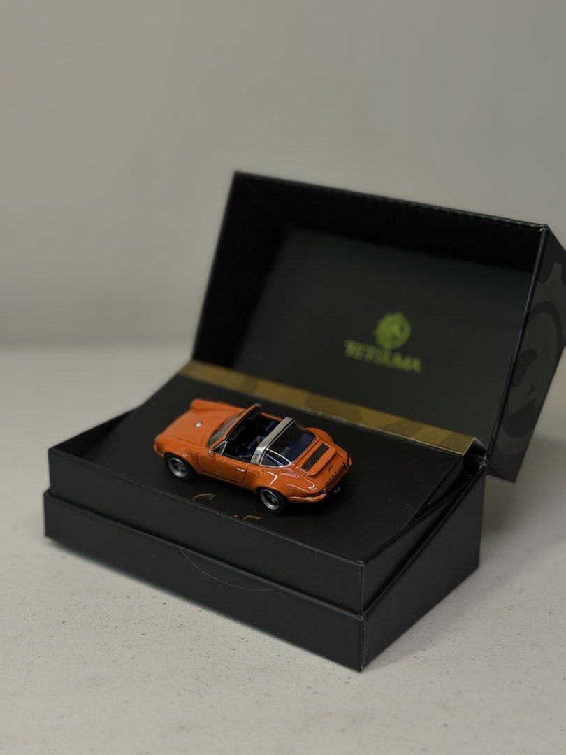 Tetsuma Singer Porsche Targa 1:64 Orange (Category: Vehicle & Diecast Models) located in Manila. Submitted by kelvs1435 (Listing ID 1471188239, Image 2). Description: - Brand: Tetsuma - Scale: 1:64 Porsche Targa in bright orange - Interior: Detailed with blue houndstooth seats - Special Feature: Singer signature on the base - Packaging: Premium display box with gold branding included.