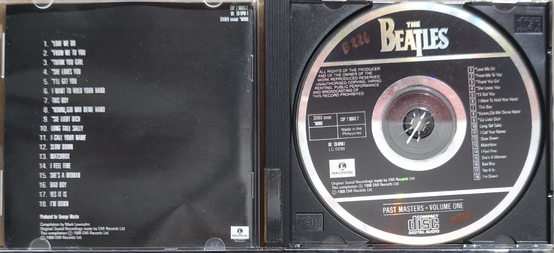 The Beatles - Past Masters Volume One CD (Category: CDs & DVDs) located in Manila. Submitted by ruelcabrer77078 (Listing ID 1471286749, Image 2). Description: - Title: The Beatles Past Masters Volume One Audio CD - Tracklist: Includes 18 classic hits like Love Me Do, She Loves You, and I Want To Hold Your Hand - Label: Official Parlophone release, manufactured and distributed by EMI Philippines, Inc. - Condition/Packaging: Standard jewel case wit