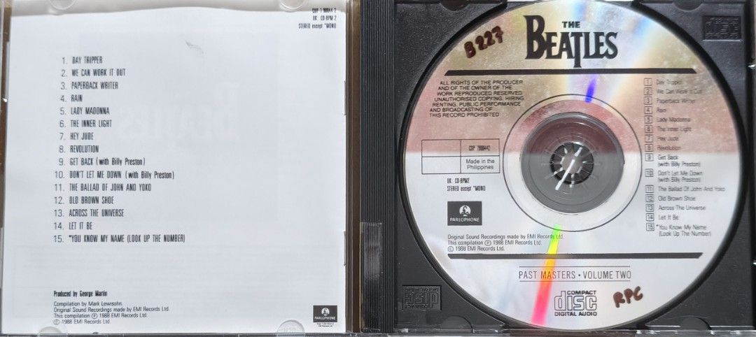 The Beatles Past Masters Volume Two CD Album (Category: CDs & DVDs) located in Manila. Submitted by ruelcabrer77078 (Listing ID 1471286776, Image 2). Description: Original The Beatles Past Masters Volume Two audio CD, compilation from 1988. Includes 15 tracks like Day Tripper, Hey Jude, and Let It Be. Manufactured and distributed by EMI Philippines, Inc. Case and inserts included with handwritten notes on the back inlay. Disc includes track listi