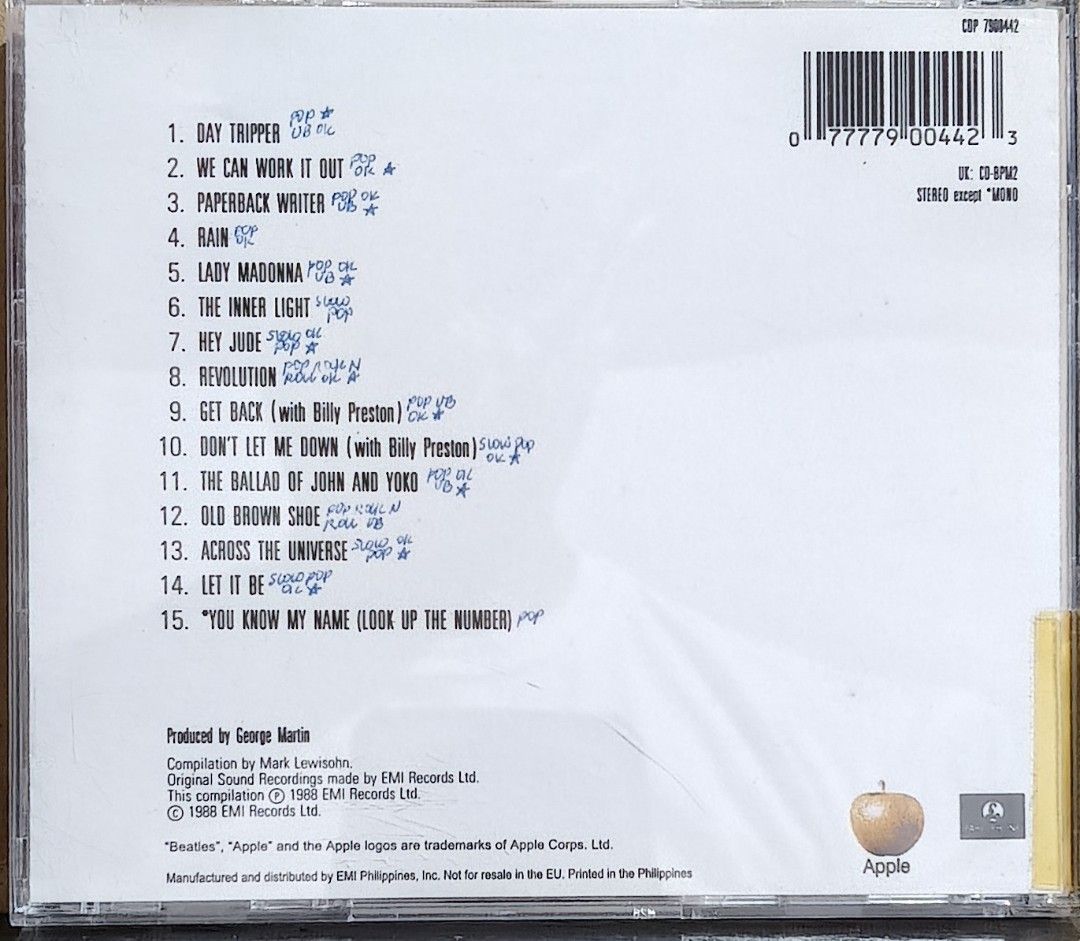The Beatles Past Masters Volume Two CD Album (Category: CDs & DVDs) located in Manila. Submitted by ruelcabrer77078 (Listing ID 1471286776, Image 3). Description: Original The Beatles Past Masters Volume Two audio CD, compilation from 1988. Includes 15 tracks like Day Tripper, Hey Jude, and Let It Be. Manufactured and distributed by EMI Philippines, Inc. Case and inserts included with handwritten notes on the back inlay. Disc includes track listi
