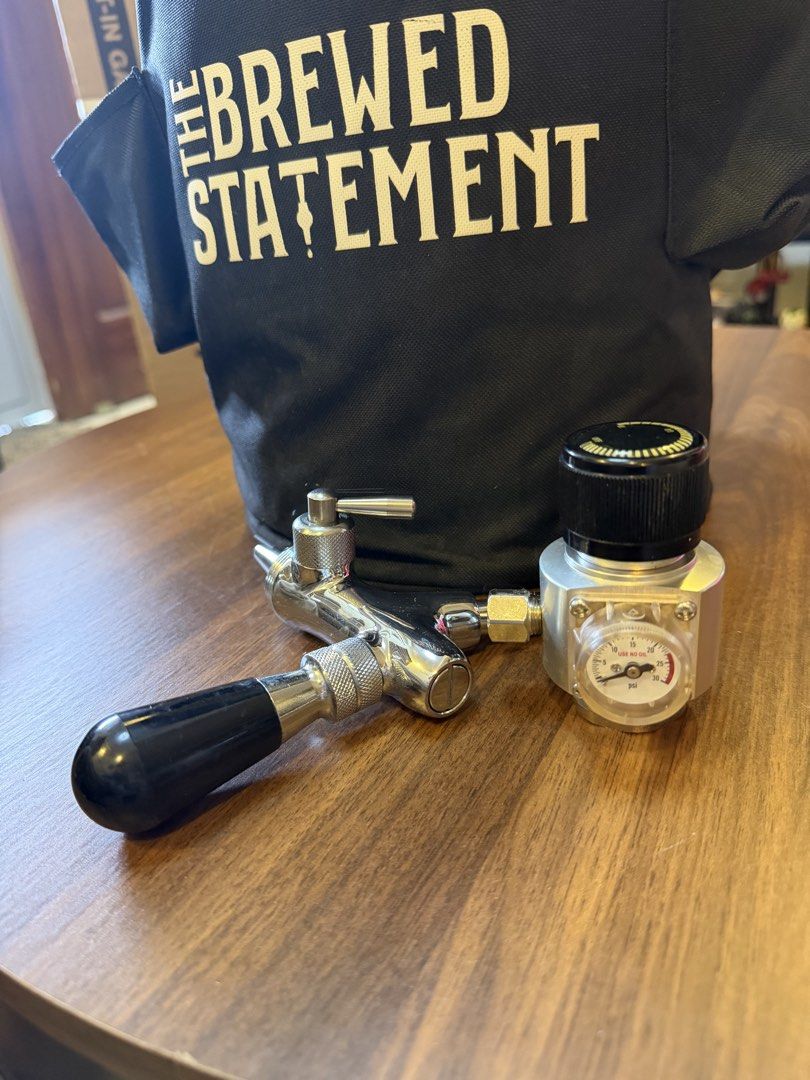 The Brewed Statement Mini Keg System (Category: Coffee Machines & Makers) located in Cavite. Submitted by trueluxury_boutique (Listing ID 1471161988, Image 2). Description: THE BREWED STATEMENT MINI KEG DISPENSING SYSTEM ₱6,500 – Negotiable Brand new, never used! Portable mini keg dispensing system with accessories and branded insulated carrying bag. Ideal for enthusiasts looking to set up a portable draft beverage station. Included items (as pho