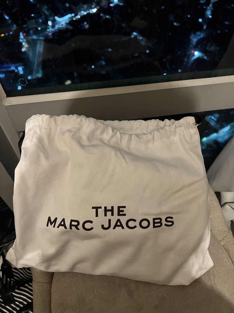 The Marc Jacobs Snoopy Snapshot Camera Bag Yellow (Category: Other Accessories) located in Imus. Submitted by ann__xoxo (Listing ID 1471178684, Image 2). Description: - Brand new with tags and protective plastic intact - Authentic Marc Jacobs Snapshot Camera Bag - Limited Snoopy edition in Chrysanth Emum Multi (Yellow) - Style number: M0016815-735 - Features double zip compartments and chic silver hardware - Comes with the original matching patte