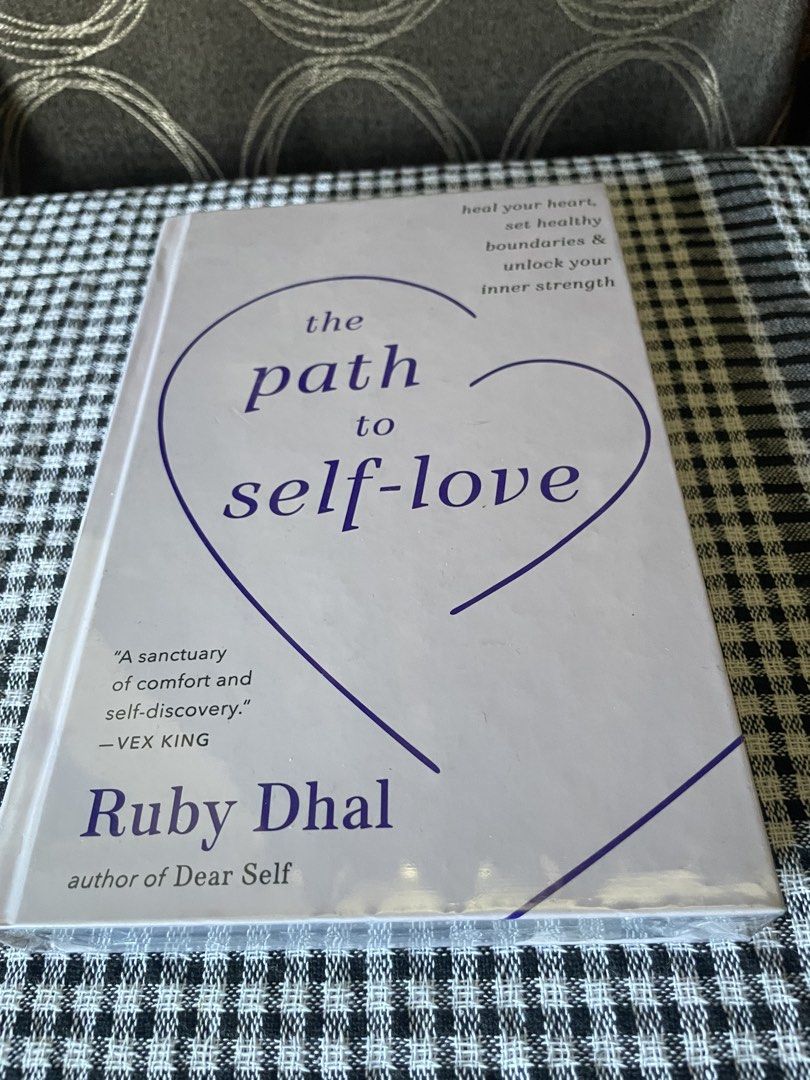 The Path to Self-Love by Ruby Dhal (Category: Storybooks) located in Quezon City. Submitted by ichikahenson (Listing ID 1471260458, Image 1). Description: Delivery fee is shouldered by buyer - Title: The Path to Self-Love by Ruby Dhal - Edition: Papercover (Purple and white theme) - Condition: Brand new, sealed in plastic wrapping, unopened, and unread - Key Themes: Healing your heart, setting healthy boundaries, and unlocking inner strength - Pe