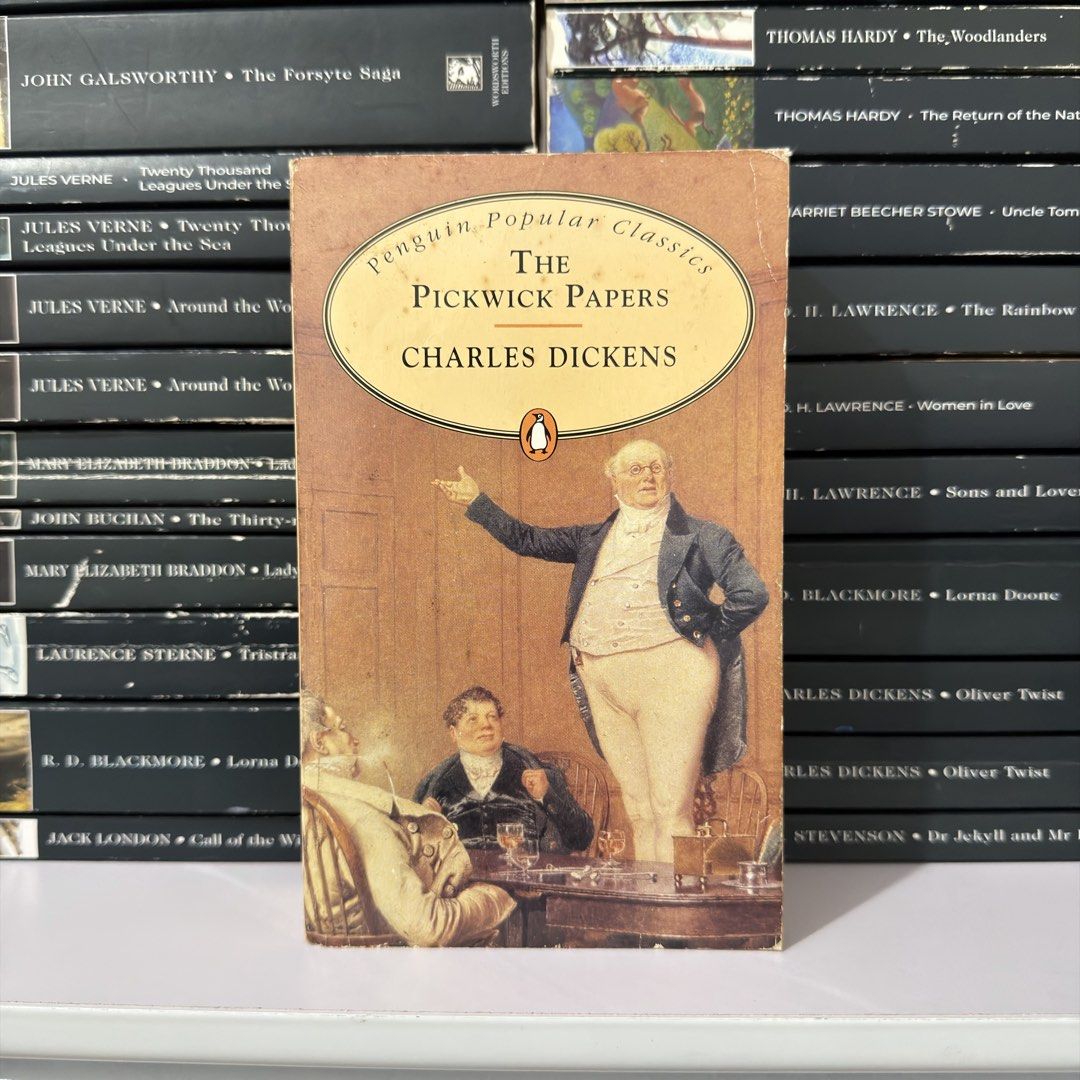 The Pickwick Papers Charles Dickens Penguin Popular Classics (Category: Storybooks) located in Lingayen. Submitted by readwjane (Listing ID 1471135870, Image 1). Description: - Title: The Pickwick Papers by Charles Dickens - Edition: Penguin Popular Classics (Paperback) - Design: Charming vintage cover illustration - Condition: Clean pages, highly readable copy - Perfect addition to your bookshelf or classic literature collection!.