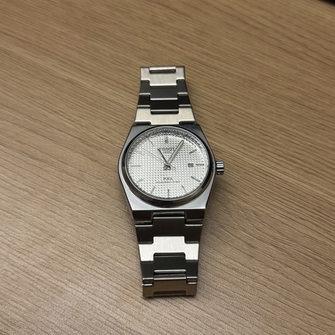 Tissot PRX (Category: Luxury Watches) located in Quezon City. Submitted by drizzyarchives (Listing ID 1471185648, Image 1). Description: Pre loved Tissot PRX Good condition Automatic No box Japan surplus 🇯🇵 ₱7.5k + SF.
