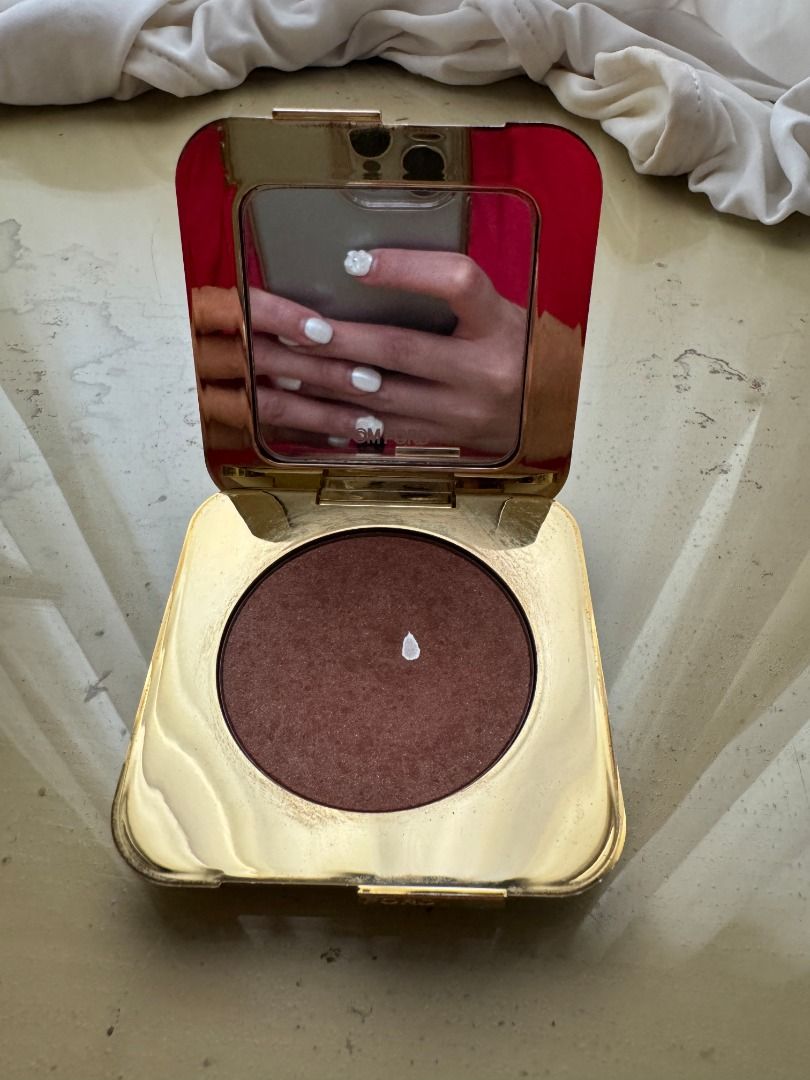 Tom Ford Bronzing Powder 01 Gold Dust (Category: Makeup) located in Cebu City. Submitted by _t.rix (Listing ID 1471136713, Image 1). Description: - Brand: Tom Ford - Product: Bronzing Powder - Shade: 01 Gold Dust - Size: Net weight 0.31 oz - Packaging: White and gold compact case with built-in mirror - Condition: Gently used a few times, lots of product left - Authenticity: Purchased from the official beauty counter.