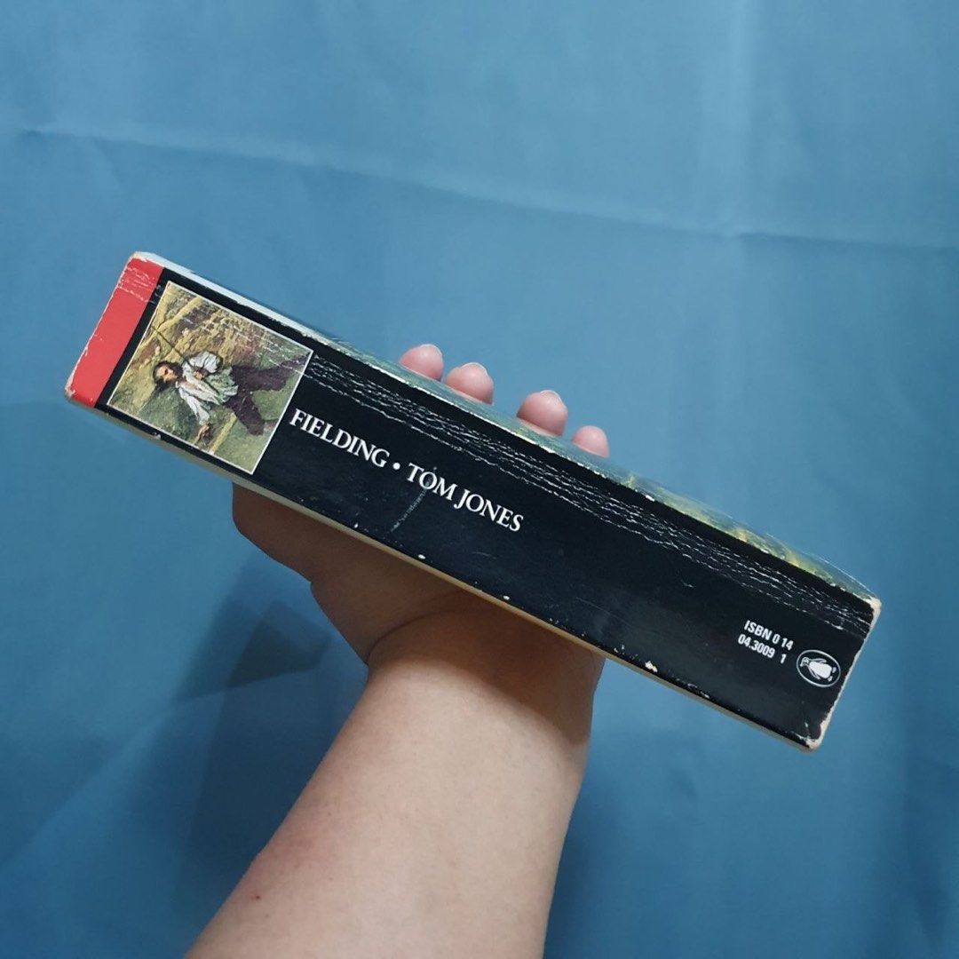 Tom Jones by Henry Fielding Penguin Classics Paperback Book (Category: Storybooks) located in San Pedro. Submitted by rainyydayy (Listing ID 1471196882, Image 3). Description: - Title: Tom Jones - Author: Henry Fielding - Editor: R.P.C. Mutter - Publisher: Penguin Classics - Format: Paperback - ISBN: 0-14-043009-1 - Condition: Minor shelf wear on edges and natural yellowing of pages due to age.