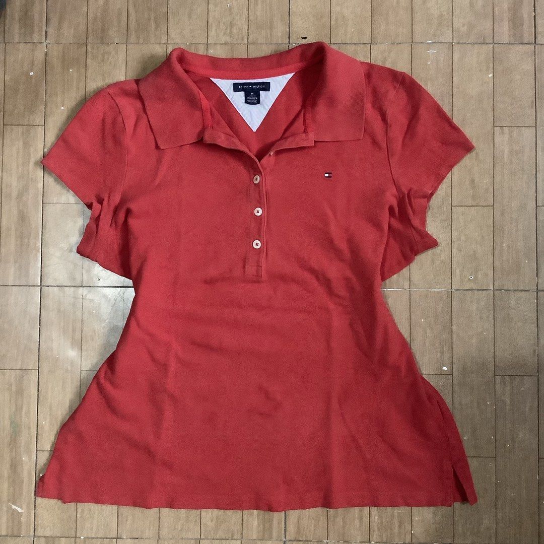 TOMMY HILFIGER red polo top (Category: Blouses) located in Santa Rosa. Submitted by lilyestrell (Listing ID 1471216791, Image 1). Description: size: large flaw: may slight stretch marks seen sa 4th pic.