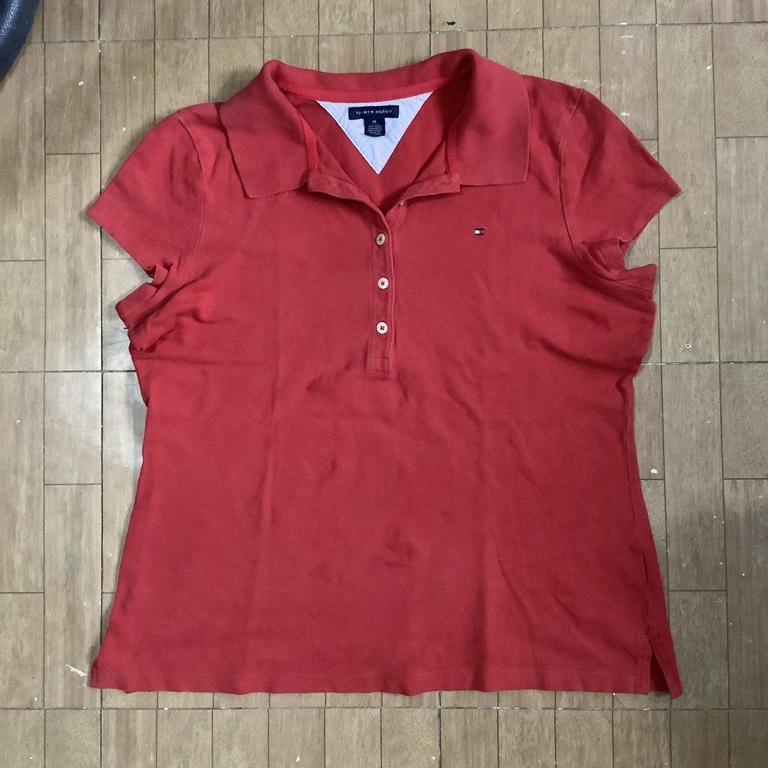 TOMMY HILFIGER red polo top (Category: Blouses) located in Santa Rosa. Submitted by lilyestrell (Listing ID 1471216791, Image 2). Description: size: large flaw: may slight stretch marks seen sa 4th pic.