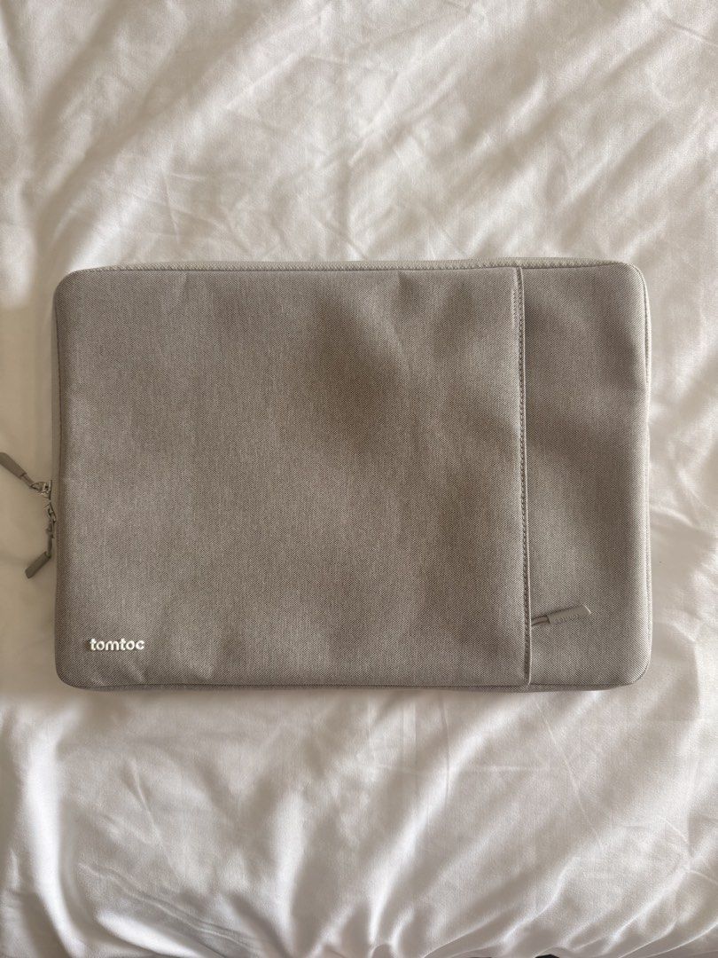 Tomtoc A13 Laptop Sleeve Dark Gray Macbook Protective Bag "16 (Category: Laptop Bags & Sleeves) located in Taguig. Submitted by regalbbb (Listing ID 1471176677, Image 1). Description: RFS: Decluttering Condition: Used only a couple of times. I don't really bring my laptop anywhere so I can't use it. No stains or flaws. Good as new. - Authentic Tomtoc laptop sleeve in stylish dark gray - Thick interior padding protects corners and edges from drops