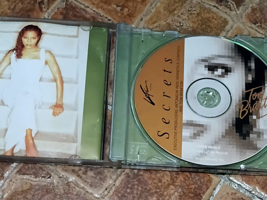 Toni Braxton Secrets CD Album (Category: CDs & DVDs) located in Quezon City. Submitted by dancatz (Listing ID 1471241559, Image 2). Description: □ P250.00 - Artist: Toni Braxton - Album: Secrets - Label: LaFace Records (1996 release) - Includes hits: Un-Break My Heart, You're Makin Me High - Condition: Clean disc surface, jewel case and booklet included - Features: Tracklist printed on back cover LFB Seller's location : Brgy. Sta. Teresita Quezon
