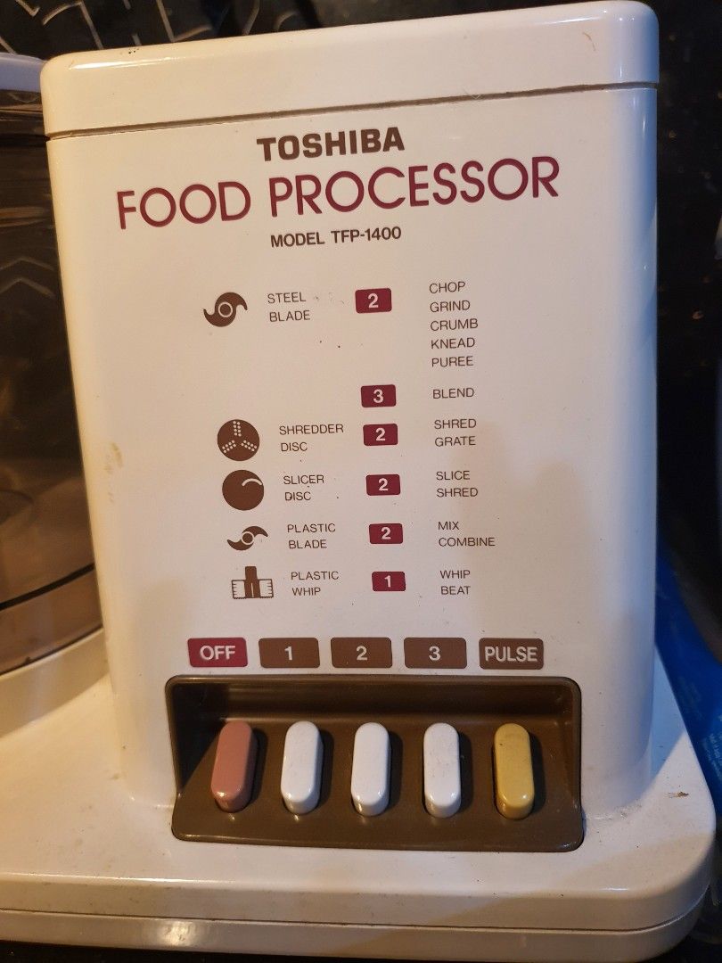 Toshiba Food Processor Model TFP-1400 with Accessories (Category: Juicers, Blenders & Grinders) located in Paranaque City. Submitted by nicessities (Listing ID 1471124033, Image 2). Description: - Brand: Toshiba TFP-1400 Food Processor **trusted brand quality product* - Functions: Multiple speed settings and pulse function for versatile kitchen tasks - Capabilities: Ideal for chopping, slicing, shredding, and mixing - Inclusions: Main motorized b