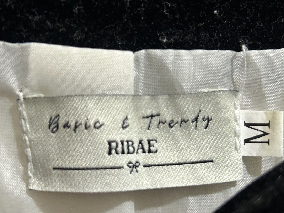 Tweed Cardigan Black and White Size M (Category: Coats, Jackets and Outerwear) located in Candaba. Submitted by neosource (Listing ID 1471266633, Image 2). Description: - Brand: RIBAE (vietnam brand) - Size: M - Material: Black & white tweed woven with gold threads - Design: Cropped style with long sleeves, contrast black velvet trim, and matching velvet bows near pockets - Closure: Pearl-like front buttons - Interior: Clean lining with brand tag