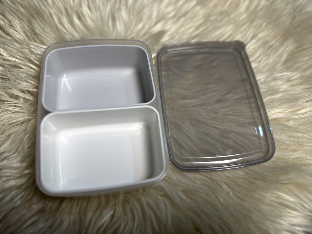 two-compartment rectangular lunch box or food container. (Category: Food Organization & Storage) located in Davao. Submitted by favoritepreloved (Listing ID 1471276717, Image 3). Description: 💜 Japan Plasticware 💜 High quality plastic 💜 14.5cm x 10.5cm x 4.5cm.