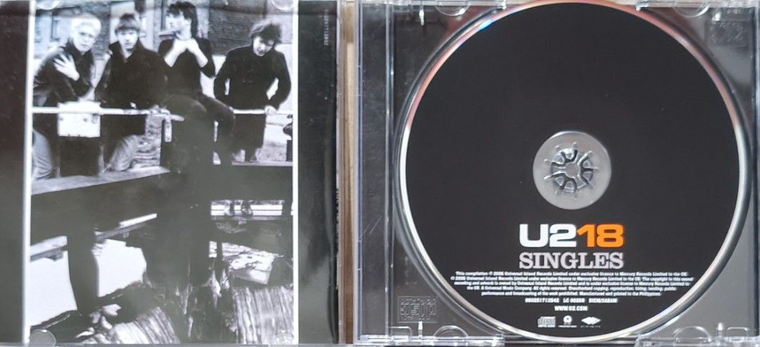 U218 Singles CD Album (Category: CDs & DVDs) located in Manila. Submitted by ruelcabrer77078 (Listing ID 1471289445, Image 2). Description: - Album: U2 Compilation (18 Tracks) - Hits included: Beautiful Day, With Or Without You, Vertigo, and more - Bonus tracks: 2 new singles including "The Saints Are Coming" (with Green Day) and "Window In The Skies" - Inclusions: Original jewel case and CD - Condition: Well-maintained - Shipping: Nationwide via
