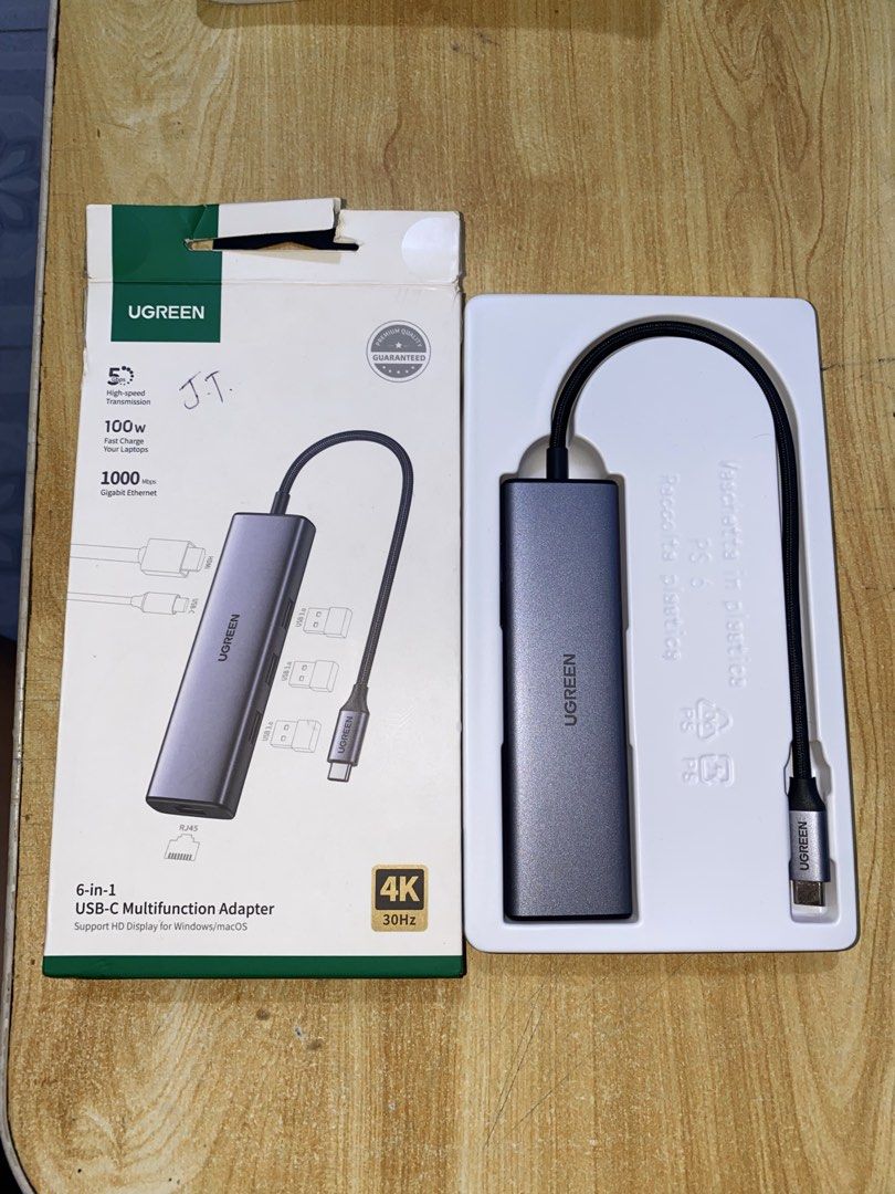 UGREEN 6-in-1 USB-C Multifunction Adapter 4K CM512 (Category: Cables & Adaptors) located in Pasig City. Submitted by mtiffy (Listing ID 1471244356, Image 3). Description: - Brand: UGREEN 6-in-1 USB-C Multifunction Adapter (Space Grey) - Condition: Used But Like New. Opened to be checked and tested only ONCE. - Ports included: 4K HDMI, 3 x USB 3.0, Gigabit Ethernet - Power: Supports 100W Power Delivery (PD) - Compatibility: Works seamlessly with b