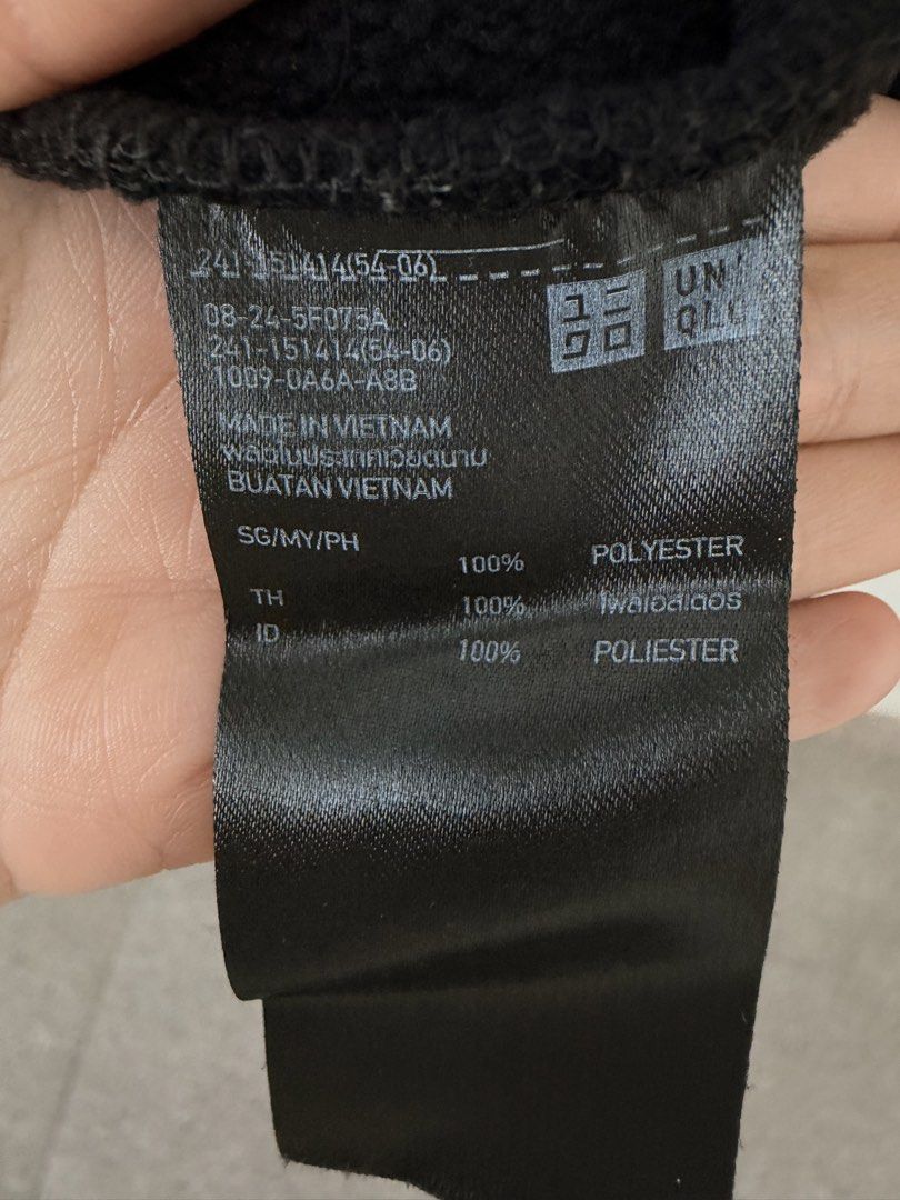 Uniqlo Black Fleece Full Zip Jacket (Category: Coats, Jackets and Outerwear) located in Quezon City. Submitted by mynameismio (Listing ID 1471179393, Image 2). Description: - Brand: Uniqlo - Color: Black - Material: 100% polyester (Made in Vietnam) - Features: Full zip closure, stand collar, and 2 secure zippered side pockets - Condition: Clean, excellent overall condition - Perfect warm outer layer for cold weather or commute.