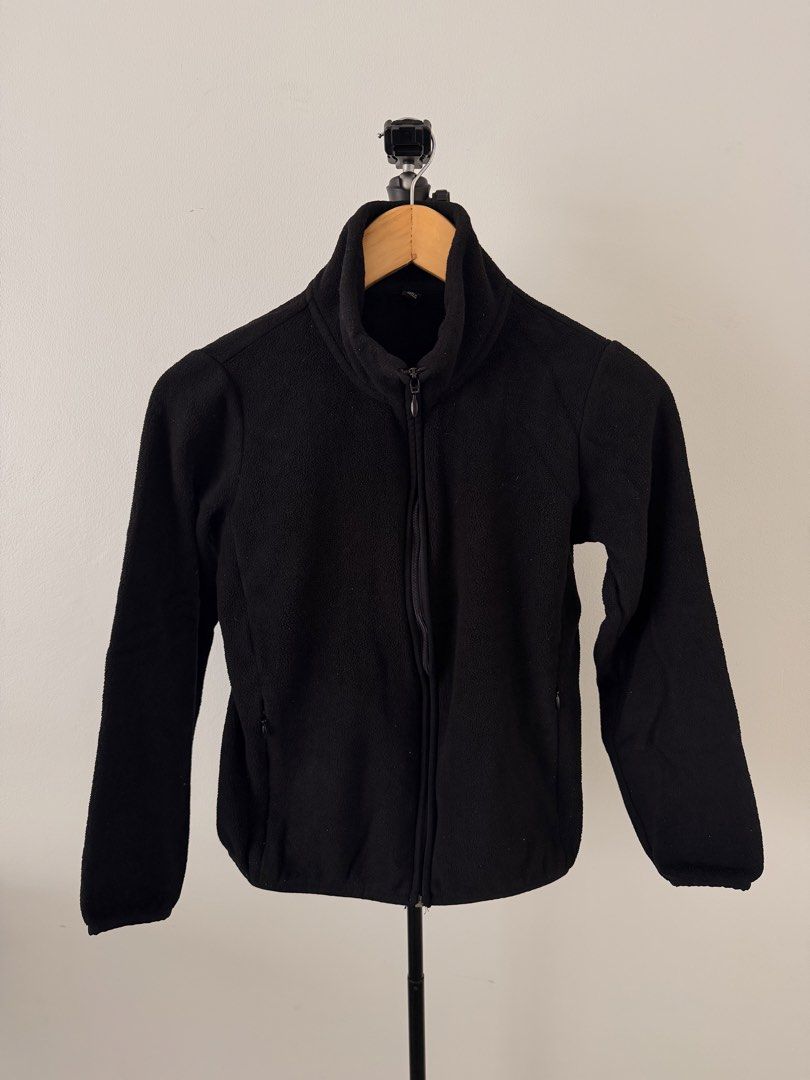 Uniqlo Black Fleece Full Zip Jacket (Category: Coats, Jackets and Outerwear) located in Quezon City. Submitted by mynameismio (Listing ID 1471179393, Image 1). Description: - Brand: Uniqlo - Color: Black - Material: 100% polyester (Made in Vietnam) - Features: Full zip closure, stand collar, and 2 secure zippered side pockets - Condition: Clean, excellent overall condition - Perfect warm outer layer for cold weather or commute.